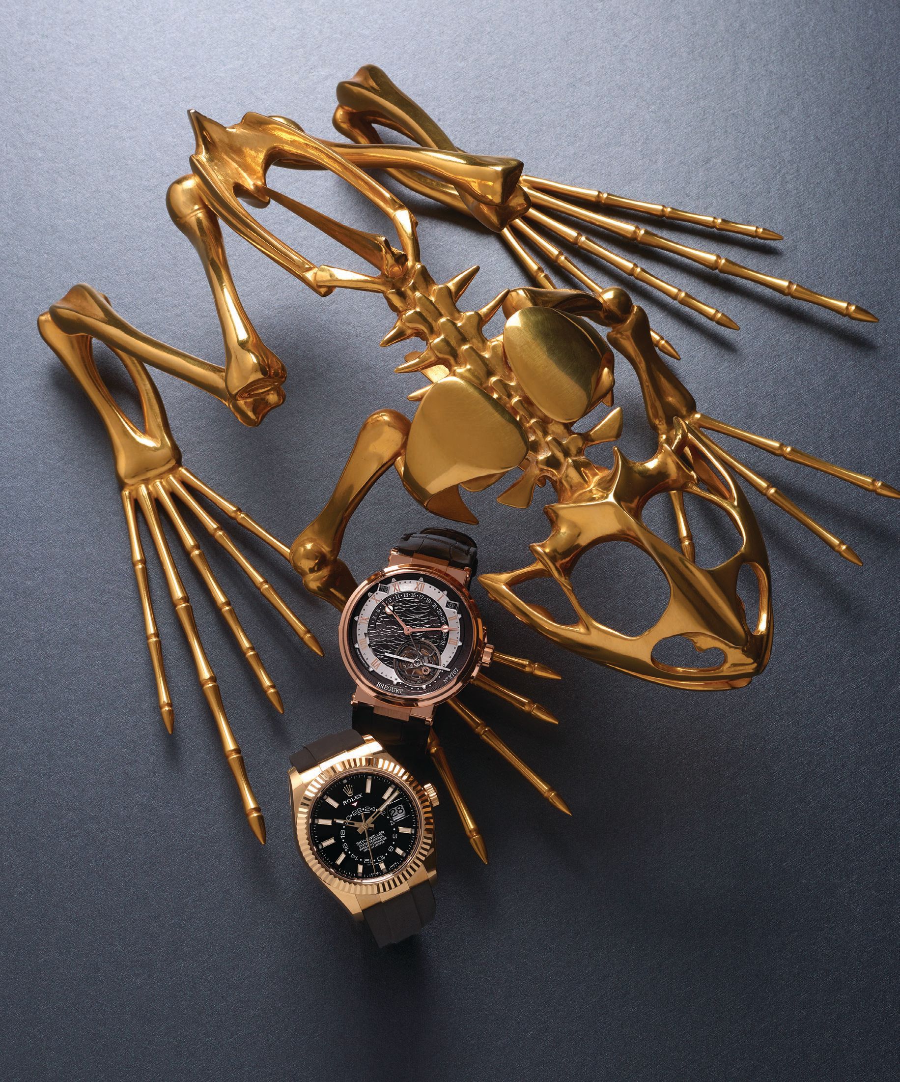 From top: Breguet Marine Equation Marchante 5887 timepiece, breguet.com; Rolex Sky-Dweller 42 mm timepiece in yellow gold, rolex.com.