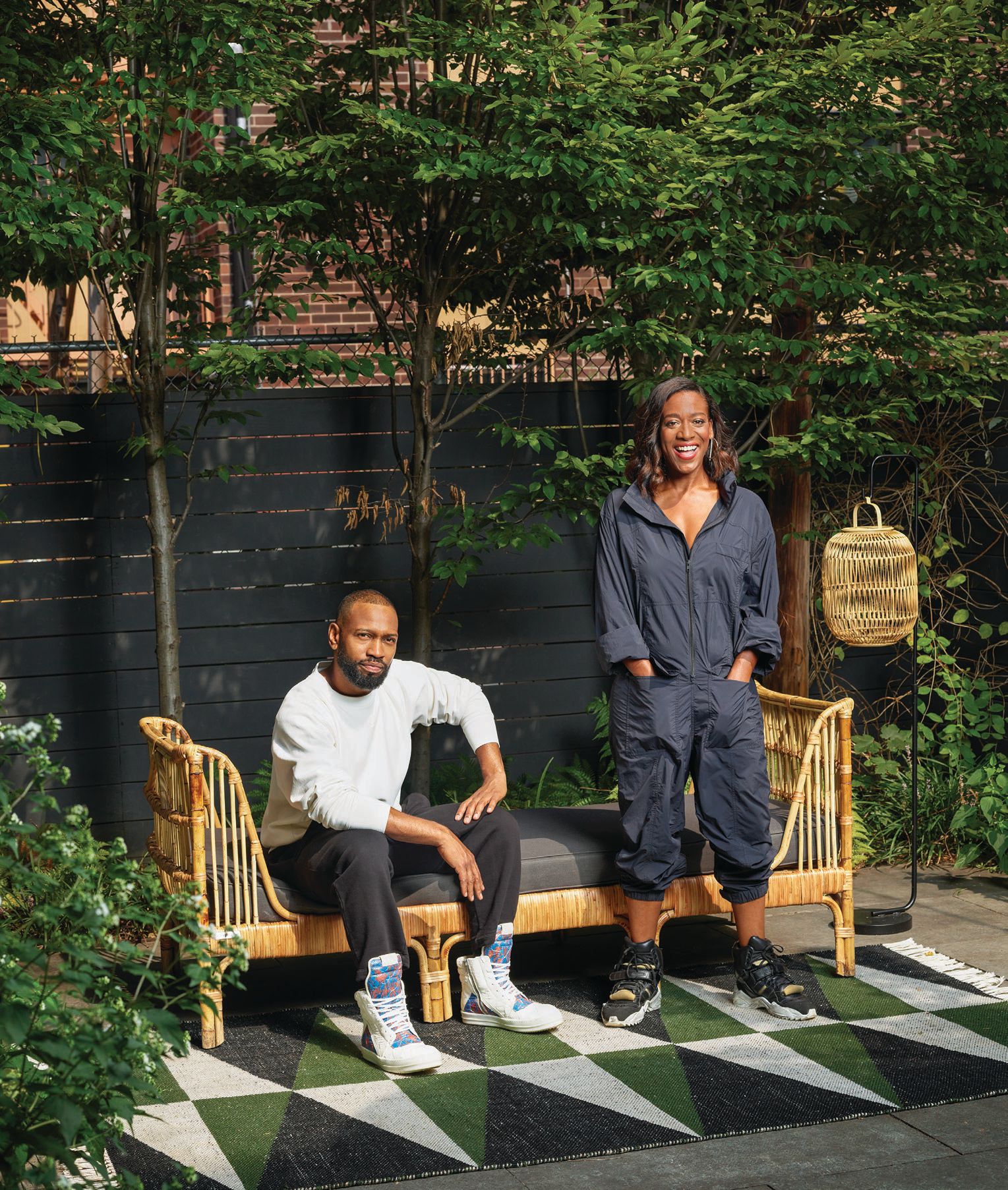 “Sneaking Around”: Quinn and Augustin-Quinn in their backyard garden. Photographed by Frank Frances