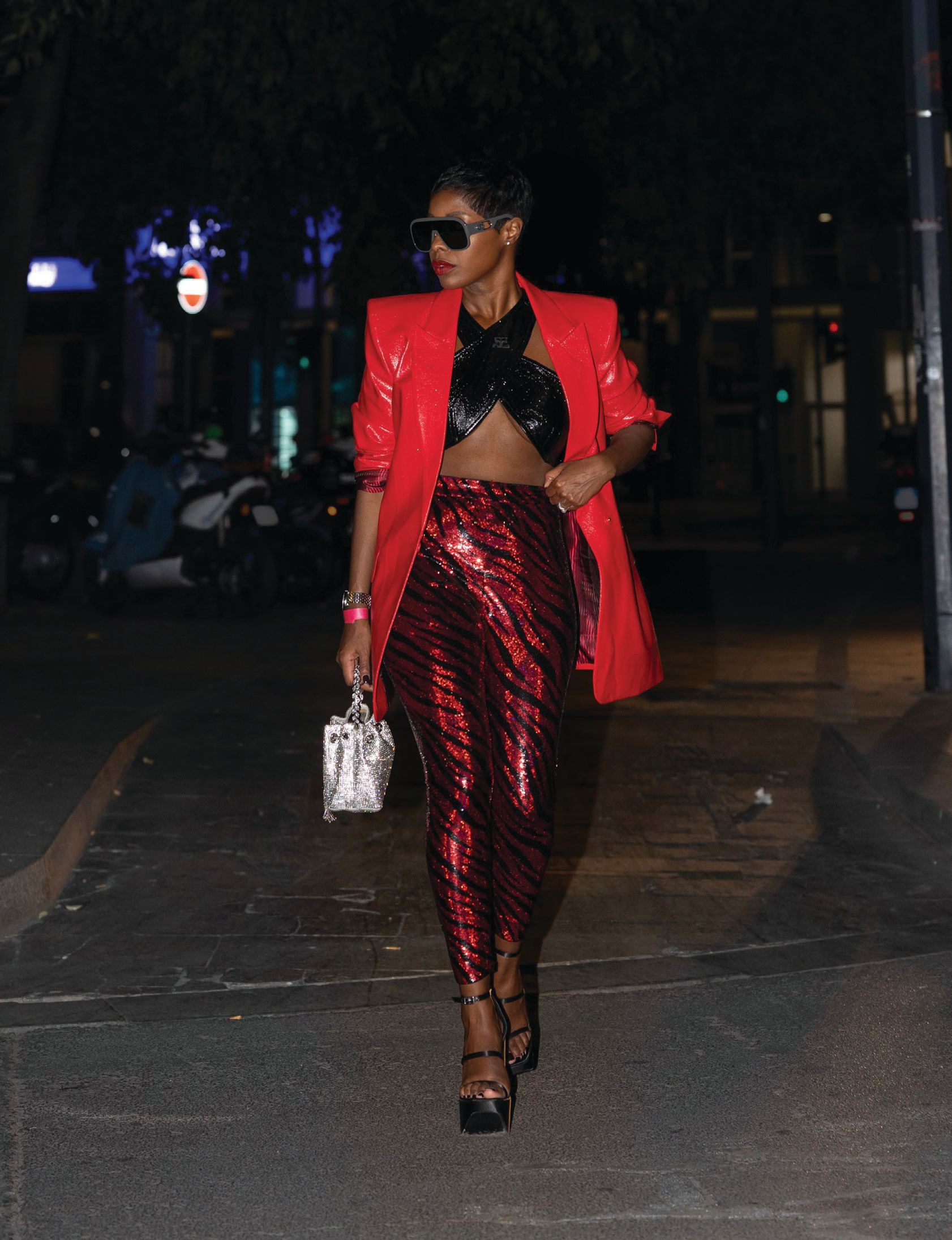 Jenee Naylor heading to the Philipp Plein spring/ summer 2023 runway show during Paris Fashion Week September 2022 Photographed by Josh Prieto