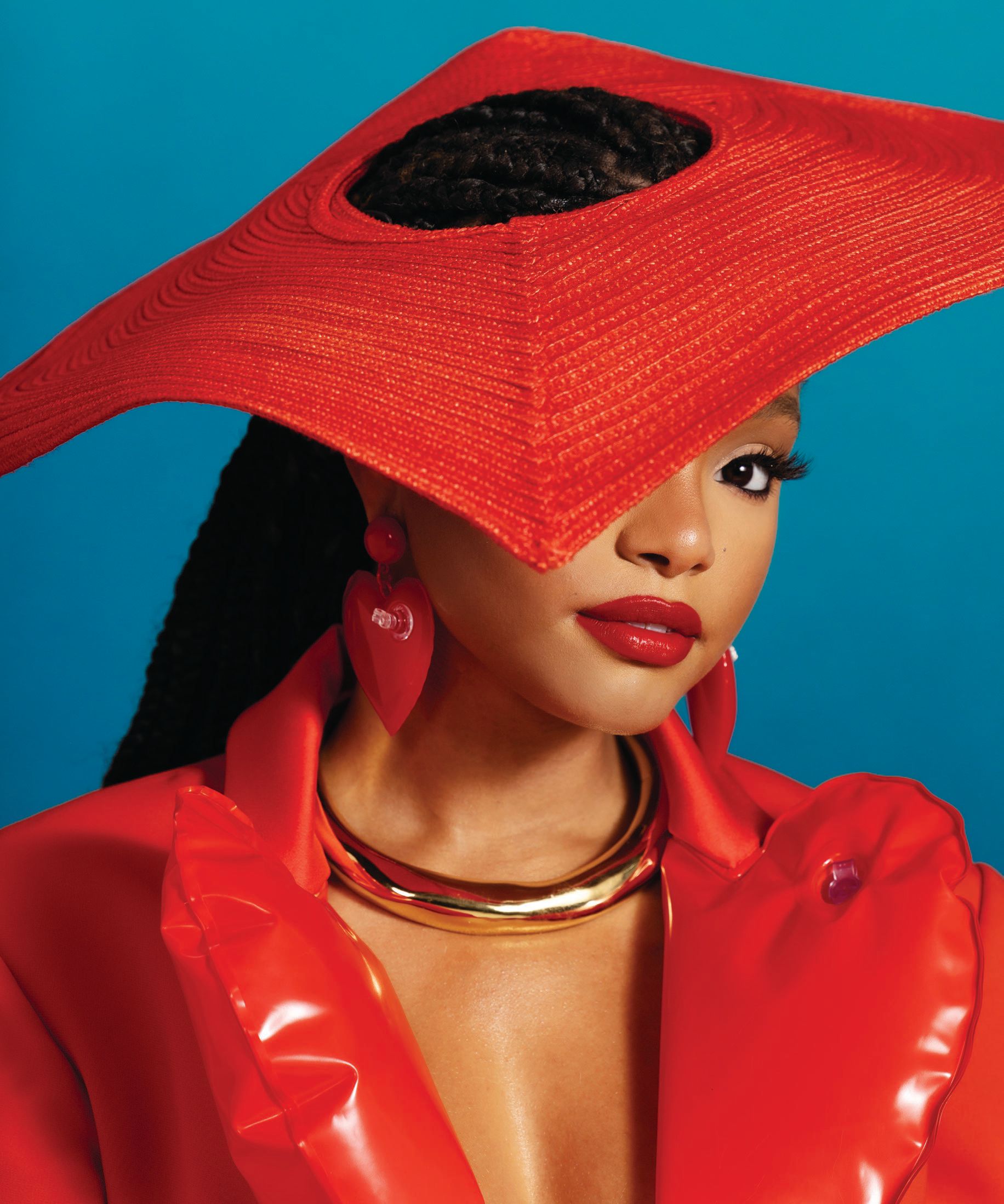 Moschino suit, hat and earrings, moschino.com; Alexis Bittar necklace, alexisbittar.com. Photo Assistant: Will Azcona Hair by Fesa Nu Makeup by Christiana Cassell PHOTOGRAPHED BY RAVEN B. VARONA STYLED BY NICHOLE GOODMAN