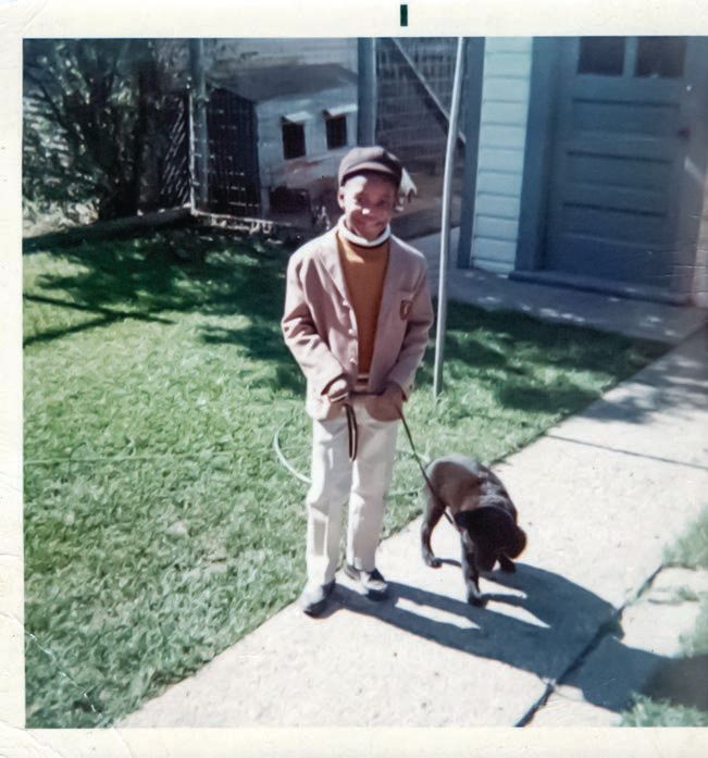 Kevin with his pet dog PHOTO COURTESY OF THE SHIRLEY HARRY COLLECTION