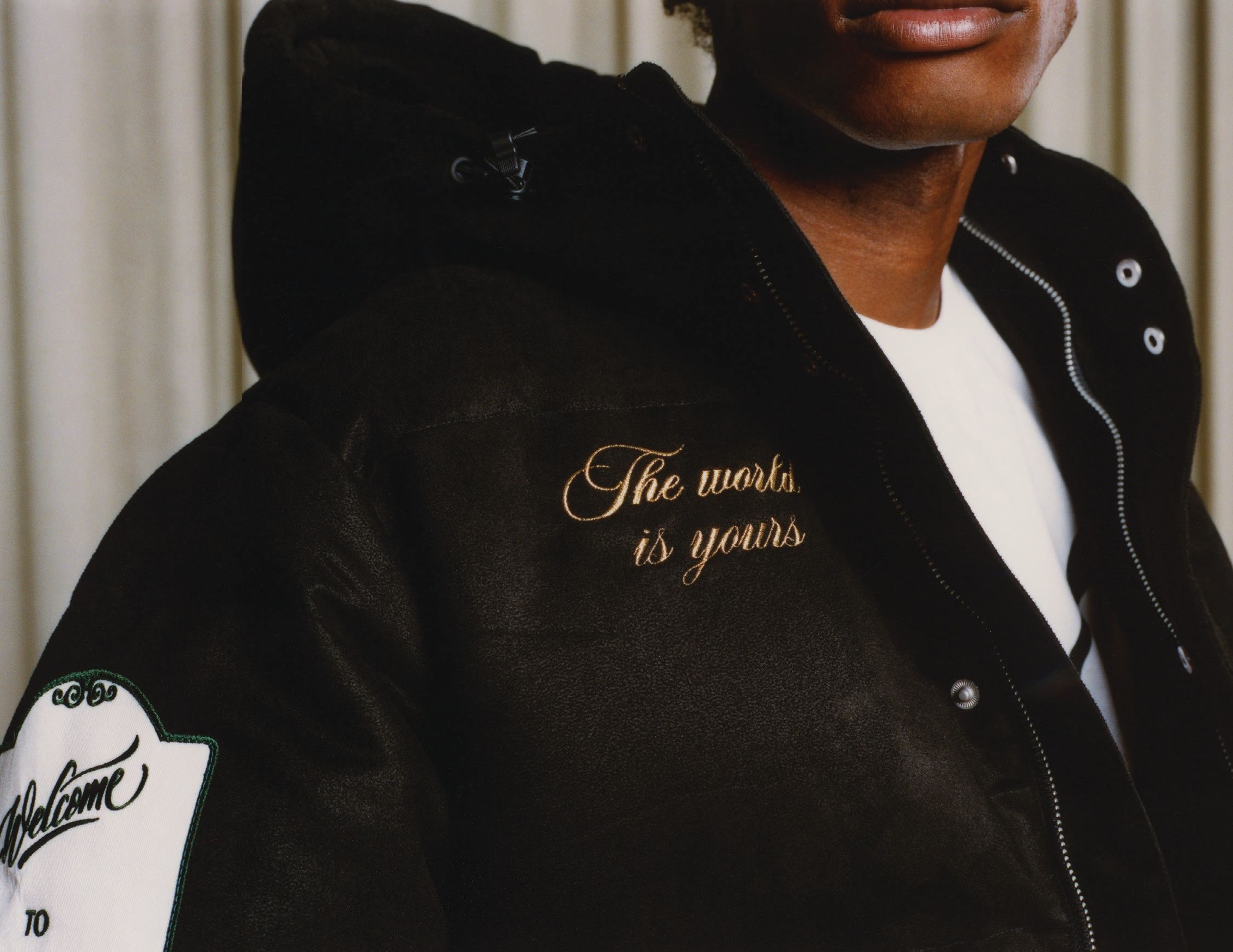 “The world is yours” letter detailing on the PUMA x Rhuigi down jacket PHOTO COURTESY OF PUMA