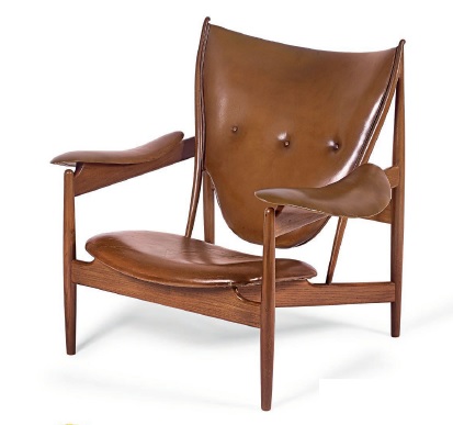 Finn Juhl (1912–89), Denmark. Chieftain armchair in teak and leather. Manufactured by cabinetmaker Niels Vodder, Denmark, underside branded “Cabinetmaker Niels Vodder Copenhagen Denmark Design Finn Juhl.” Private collection cover of The Impossible Collection of Design. PHOTO COURTESY OF ASSOULINE