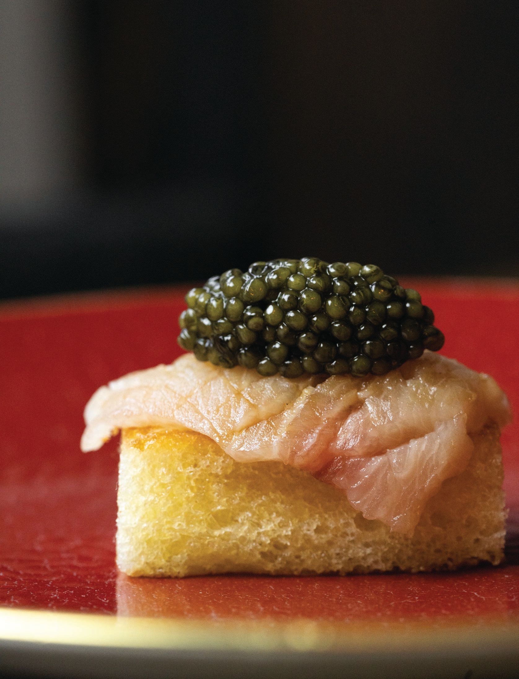 Dryaged shima aji with osetra caviar.  Photographed by Natalie Black