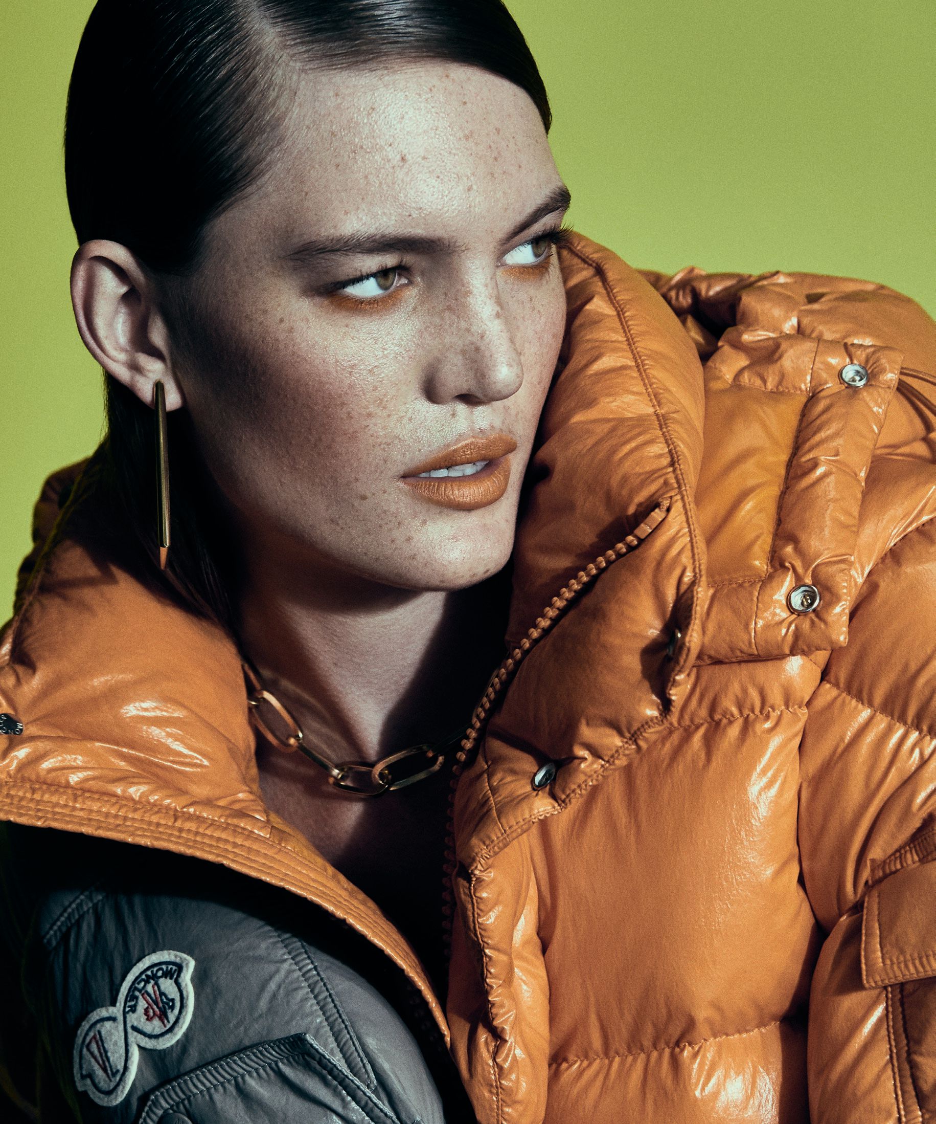 Moncler Maya 70 down jacket in Campfire Orange and Basalt Gray, moncler.com. Photographed by Yossi Michaeli Styled by Faye Power Vande Vrede