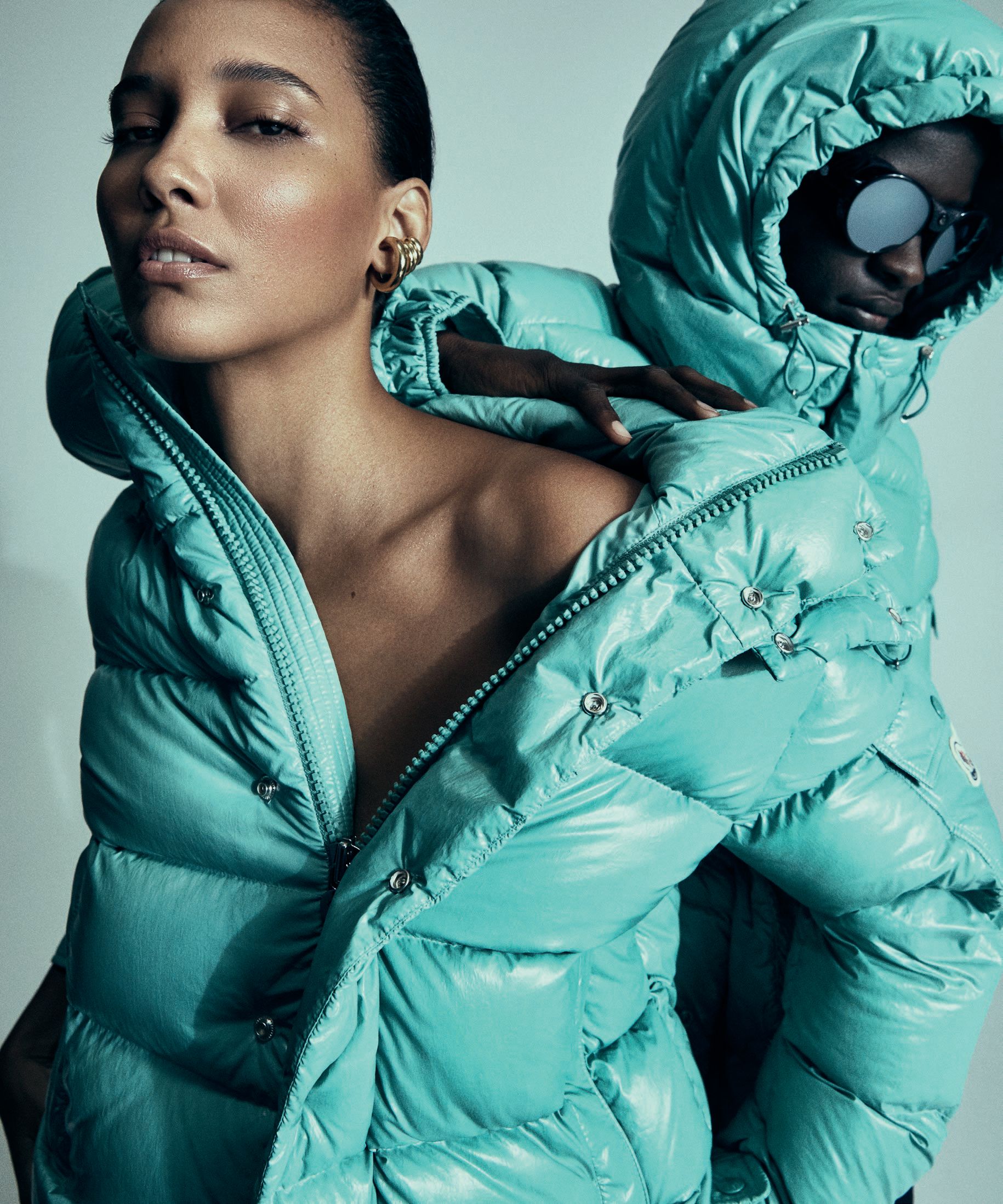 From left: Moncler Maya 70 down jacket in Lichen Green (on both) with Moncler Steradian rounded lunettes, moncler.com. Photographed by Yossi Michaeli Styled by Faye Power Vande Vrede