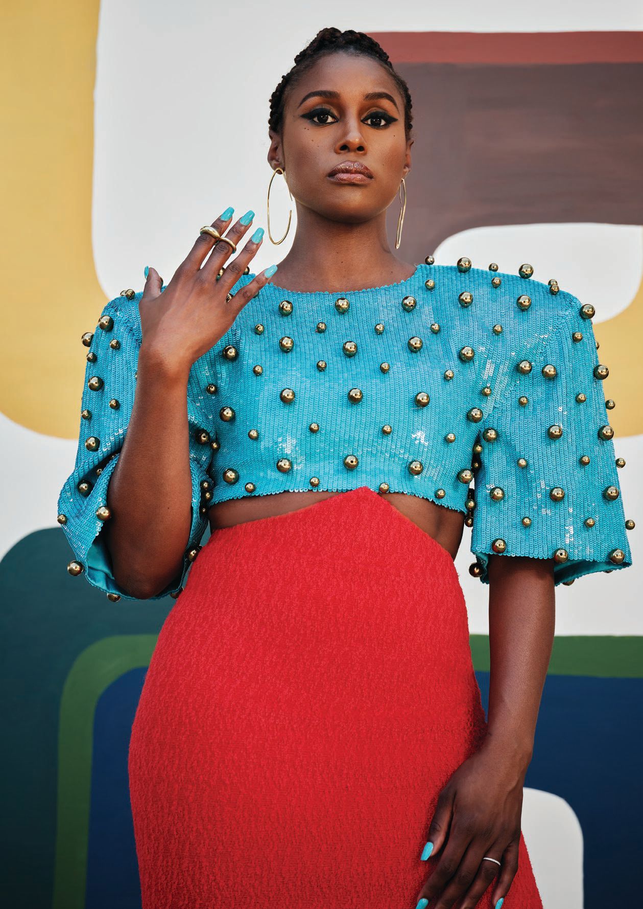 Gucci top and skirt, gucci.com; Khiry earrings and ring, khiry.com; Alexandre Birman heels, alexandrebirman.com. Styling: Jason Rembert Hair: LaRae Burress of Texture Management Inc Makeup: Joanna Simkin at The Wall Group Manicure: Yoko Sakakura at A-Frame Agency using OPI Set Design: Sam Jaspersohn at See Management Gaffer: Jason Beck Location: 10102 Angelo View Drive, Beverly Hills, Calif., designed by Disco Volante, listed with The Beverly Hills Estates Photographed by JD Barnes Styled by Jason Rembert